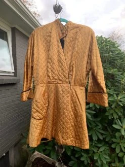 Vintage 1950s 1960s Quilted Gold Satin Robe With Black Trim And Lining