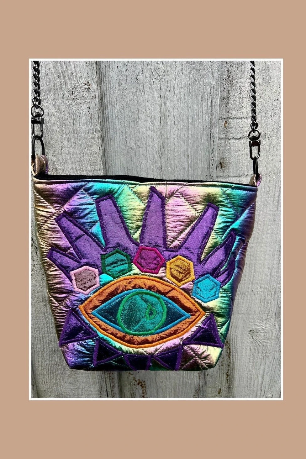 Rainbow Quilted Fabric And An Eye Design Appliqué Bucket Bag With Colorful Quilting And Inner Pocket With Shoulder Metal Strap. 4 Rainbow Quilted Fabric And An Eye Design Appliqué Bucket Bag With Colorful Quilting And Inner Pocket With Shoulder Metal Strap. - Image 4