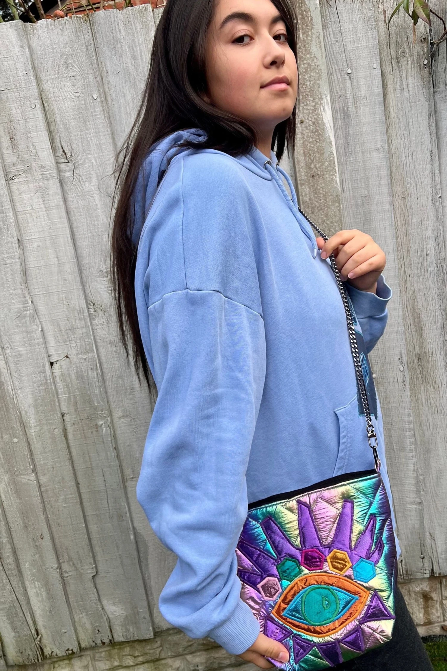 Rainbow Quilted Fabric And An Eye Design Appliqué Bucket Bag With Colorful Quilting And Inner Pocket With Shoulder Metal Strap. 7 Rainbow Quilted Fabric And An Eye Design Appliqué Bucket Bag With Colorful Quilting And Inner Pocket With Shoulder Metal Strap. - Image 7